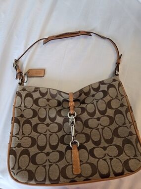 Coach Signature Canvas Hobo Bag in Brown